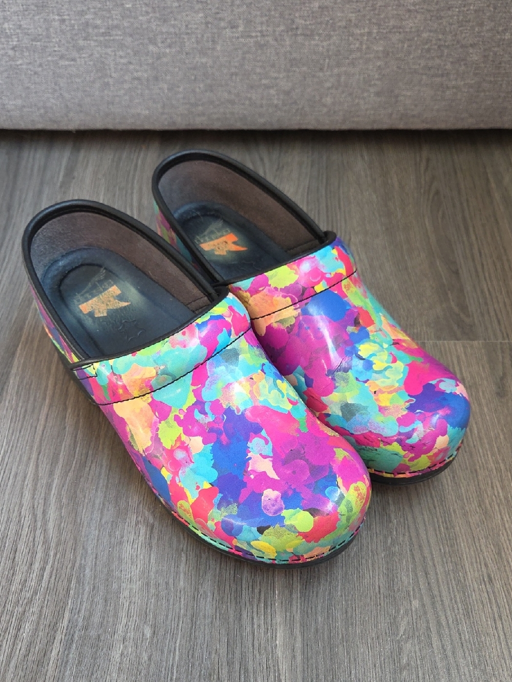 Dansko Multicolor Paint-Splash Clogs in Bright Neon Palette